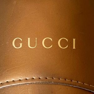 GUCCI sunglasses case.